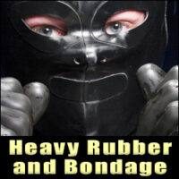 A close-up view of a person wearing a thick black rubber hood and matching rubber gloves with fists raised.